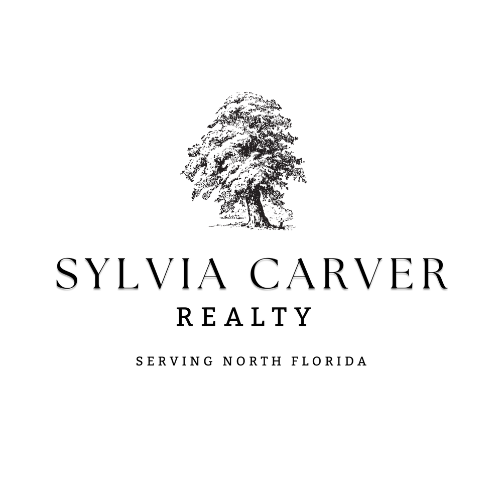Sylvia Carver Realty Logo